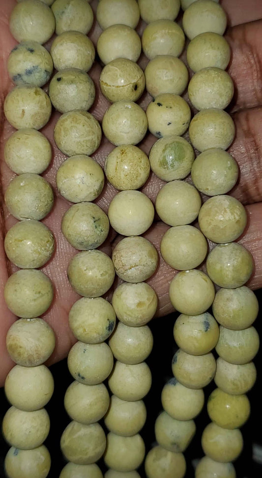 Yellow "turquoise" (serpentine with quartz), round bead, 8mm (price per strand)