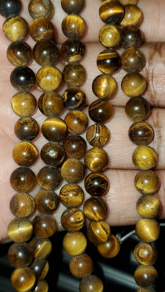 Tigereye, round bead natural 15.5-16 inch 6mm (price per strand)