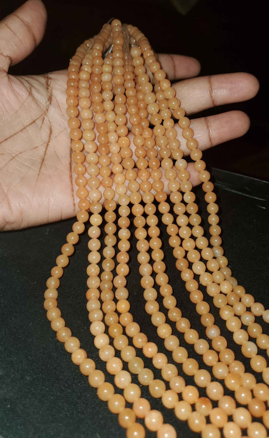 Orange Aventurine, round 5 mm (price per strand)